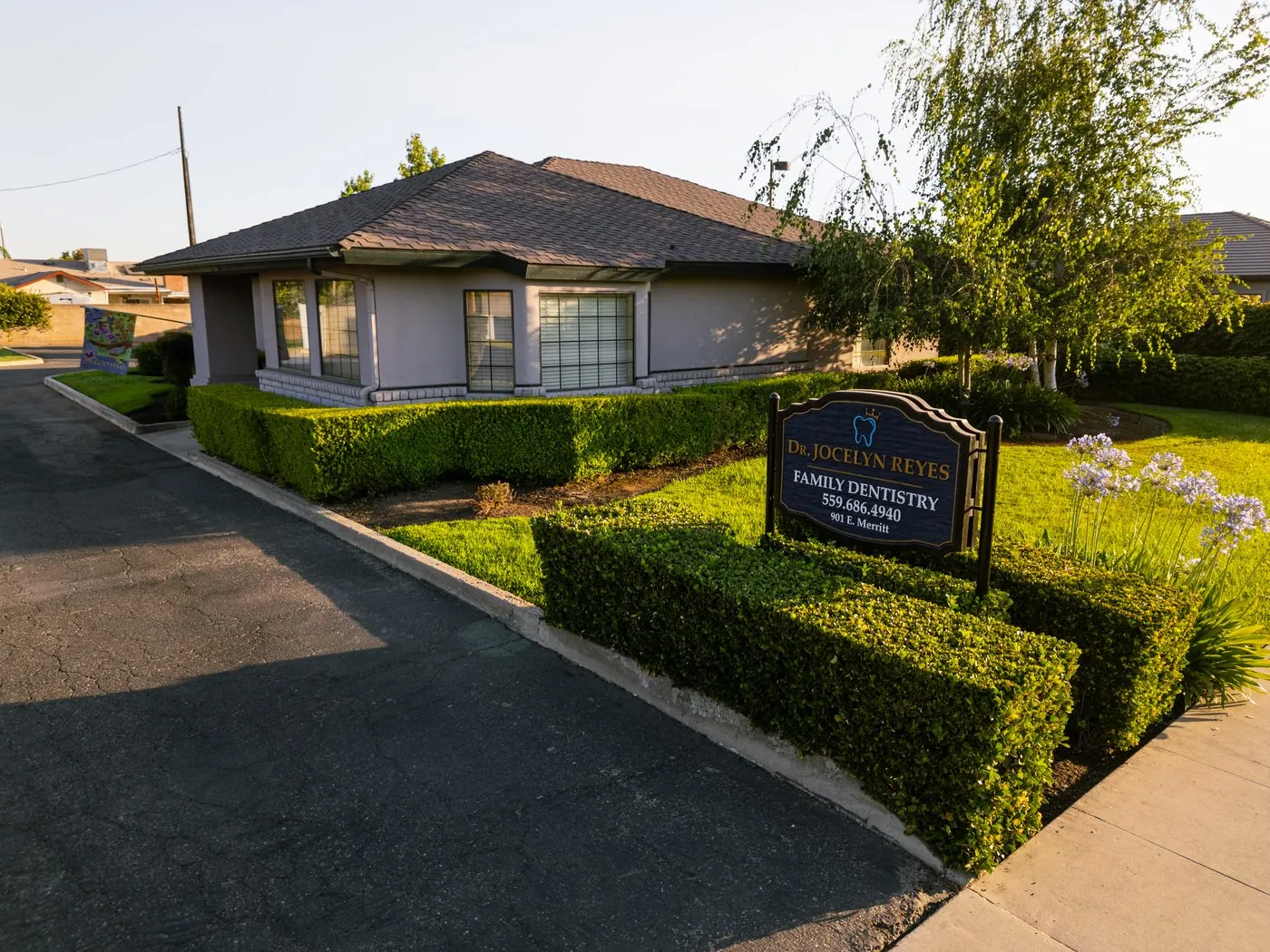 Dr. Jocelyn Reyes Family Dentistry sign at 901 E Merritt Ave, Tulare, CA